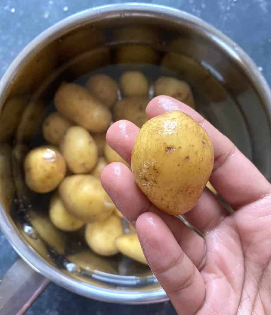 Dum Aloo is a spicy, creamy Indian curry made with baby potatoes