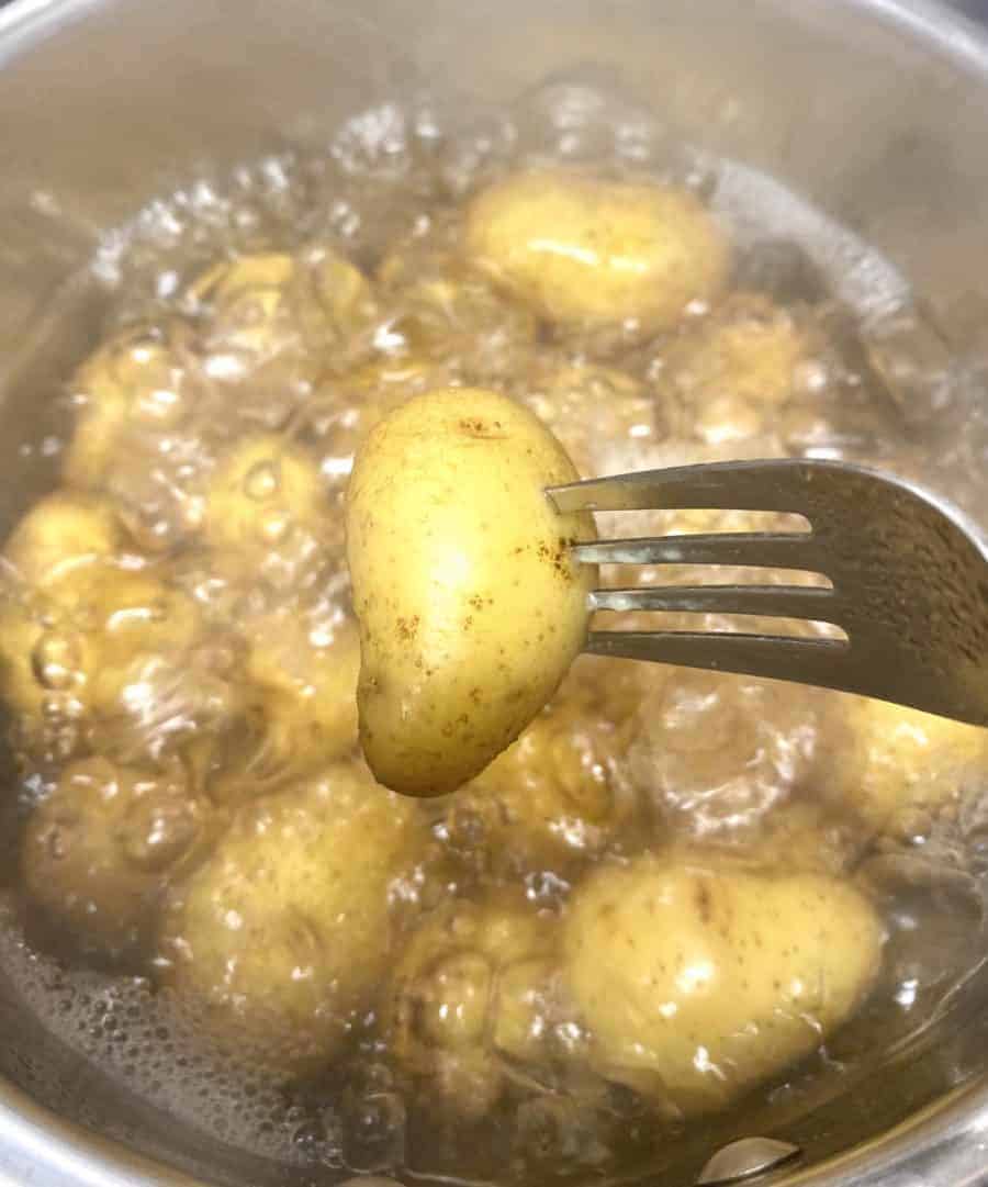 Dum Aloo is a spicy, creamy Indian curry made with baby potatoes