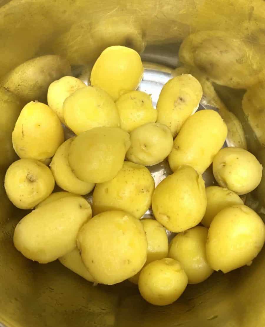 Dum Aloo is a spicy, creamy Indian curry made with baby potatoes