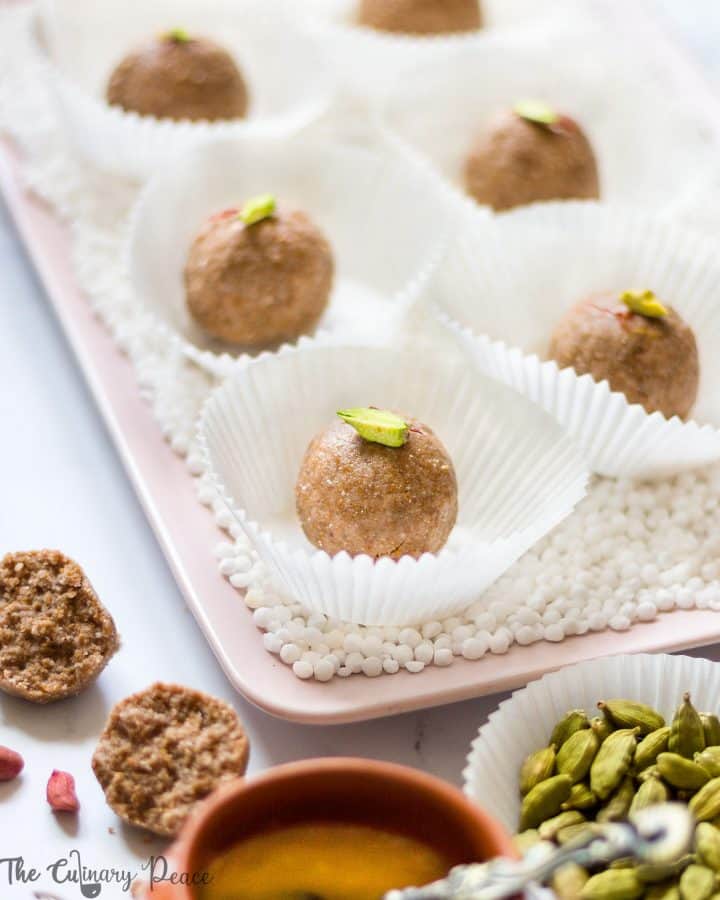 Fasting ladoo for navaratri or mahashivaratri made from sabudana, peanuts and jaggery served in cupcake liners on a white background